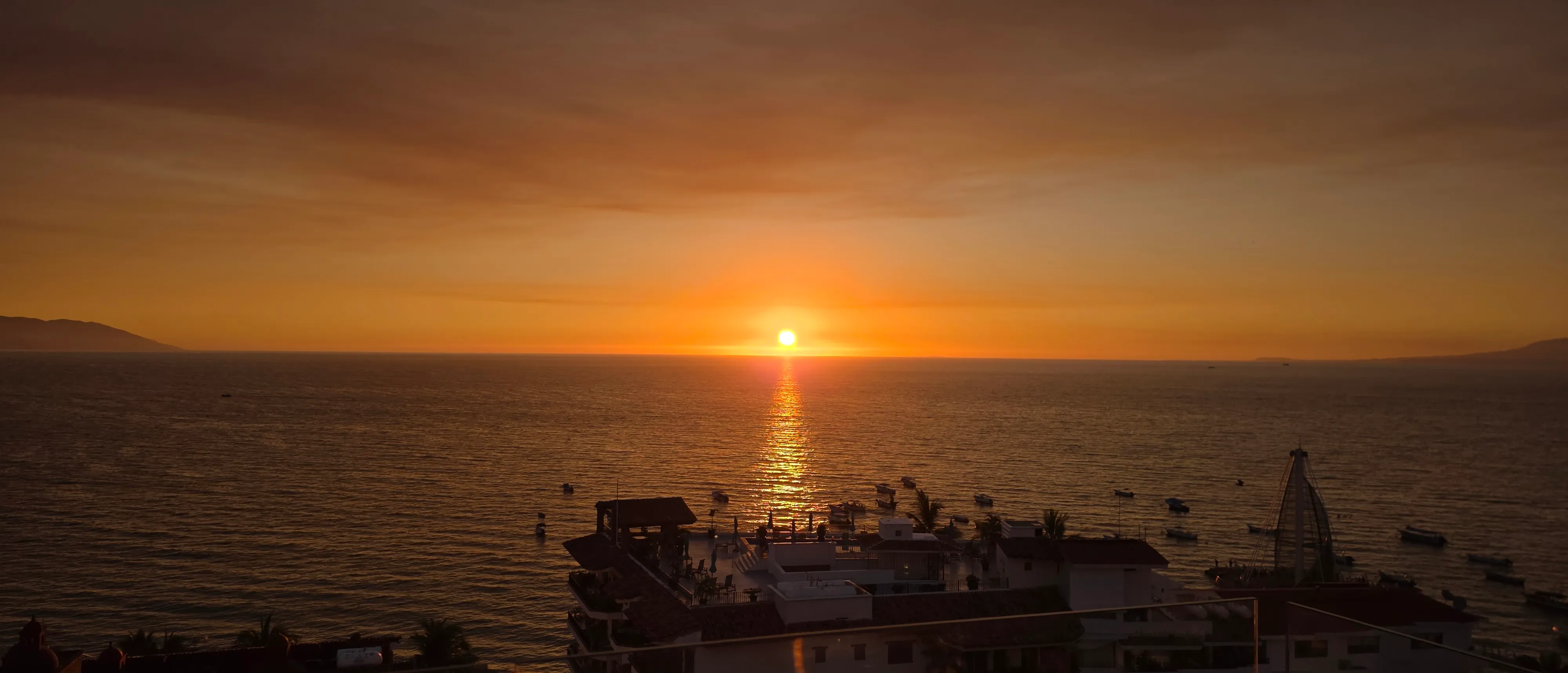 Banderas Bay at sunset from Puerto Vallarta, Mexico